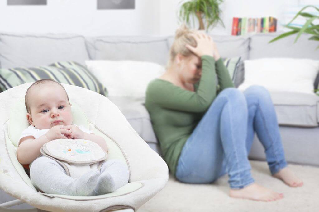 sad mom and baby